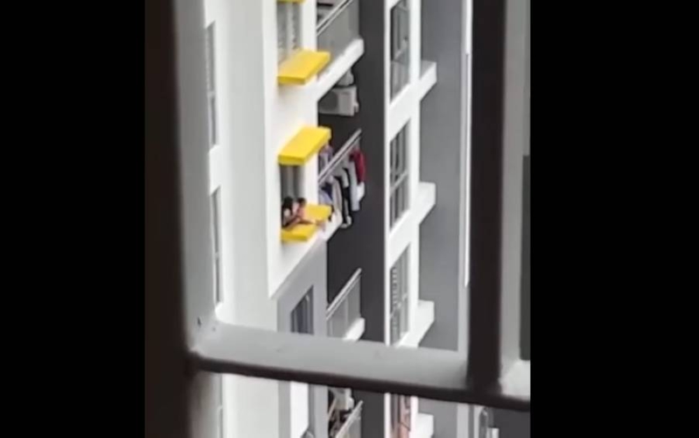 Wangsa Maju district police chief Supt Ashari Abu Samah said the video was uploaded by the owner of a Facebook account known as ‘Reff Lia’, showing two children aged four and two, unsupervised and playing close to the edge of the window balcony. — Picture from Facebook
