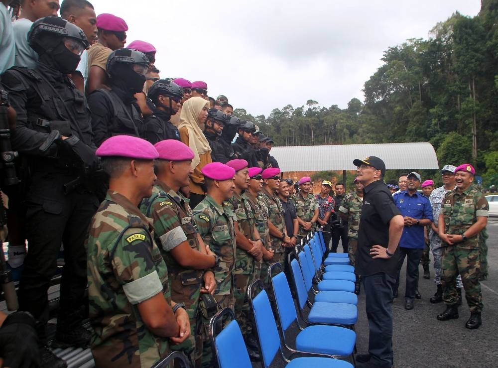 Datuk Seri Hishammuddin Hussein during an official visit to KD Panglima Garang at the Royal Malaysian Navy base in Lumut, October 26, 2022. — Bernama pic 