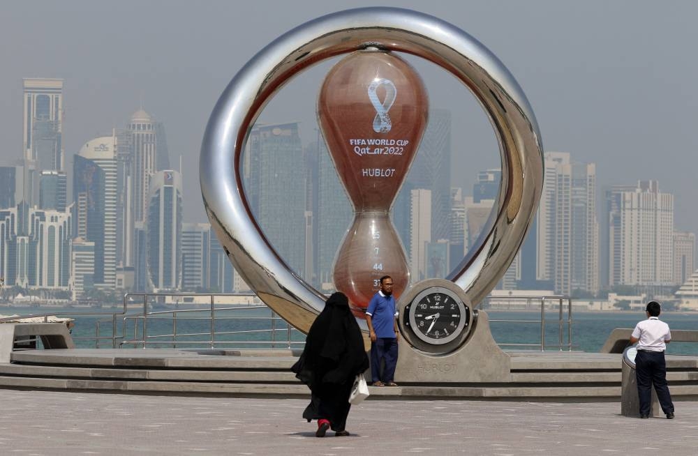 People pose for a picture ahead of the World Cup in Doha, Qatar, October 26, 2022. — Reuters pic 