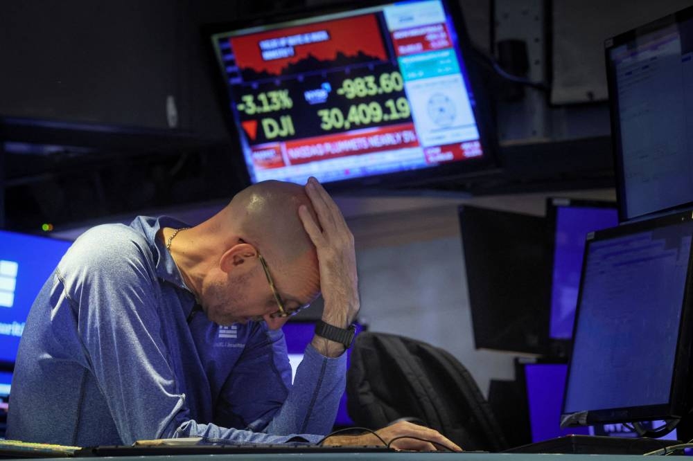 A trader works on the floor of the New York Stock Exchange in New York City June 13, 2022. — Reuters pic