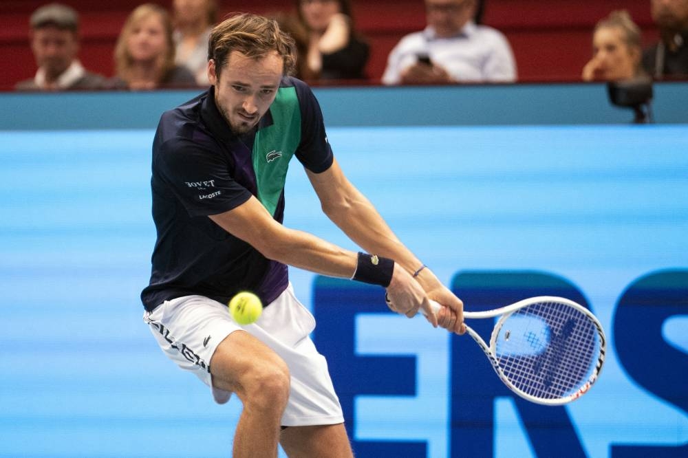 Russia's Daniil Medvedev returns the ball to Georgia's Nikoloz Basilashvili at the ATP Vienna Open tennis tournament in Vienna October 26, 2022. — AFP pic