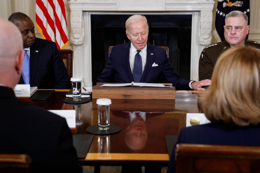US President Joe Biden attends a meeting with Defence Department leaders in the State Dining Room at the White House in Washington October 26, 2022. — Reuters pic