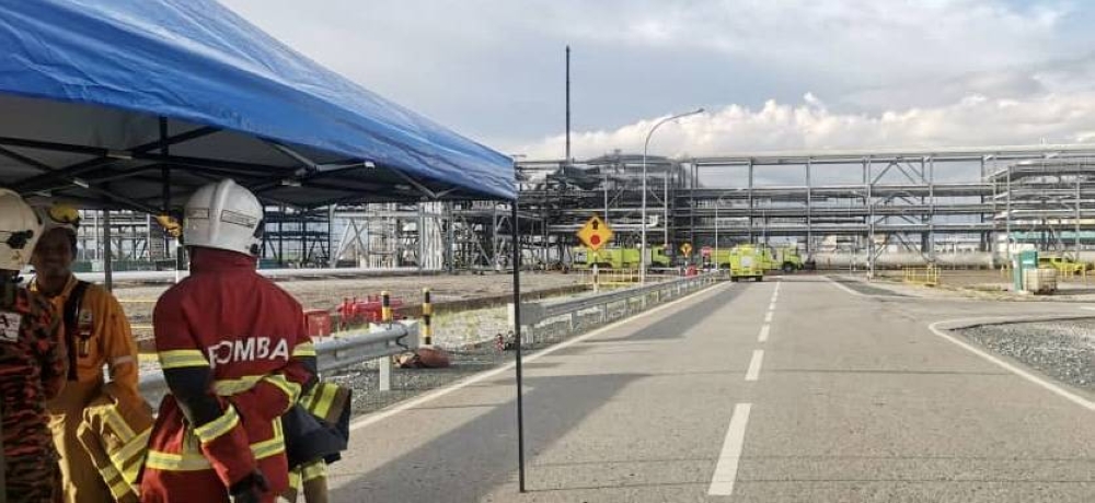 Firemen are seen at the scene of the blaze at the Pengerang Integrated Complex (PIC) in Pengerang October 27, 2022 after it was contained. — Picture courtesy of the Johor Fire and Rescue Department