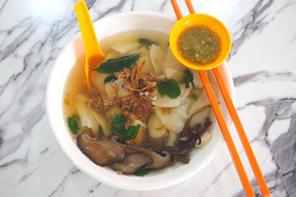 The stall also offers 'pan mee' using hand pinched dough cooked in a clear, comforting broth.