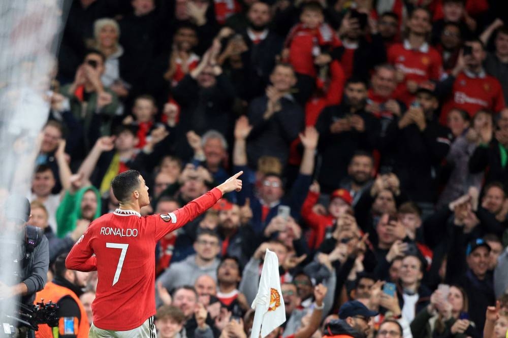 Manchester United striker Cristiano Ronaldo celebrates scoring the team’s third goal during the Uefa Europa League Group E match between Manchester United and Sheriff Tiraspol, at Old Trafford stadium, in Manchester, October 27, 2022. — AFP pic 
