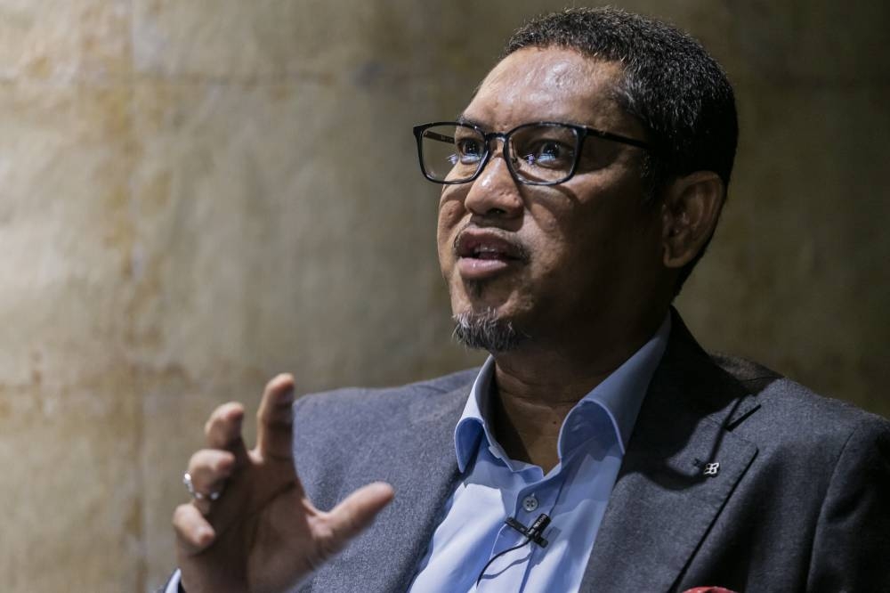 Datuk Seri Ahmad Faizal Azumu speaks to Malay Mail during an interview at his office in Plaza Damas October 25, 2022. — Picture by Hari Anggara