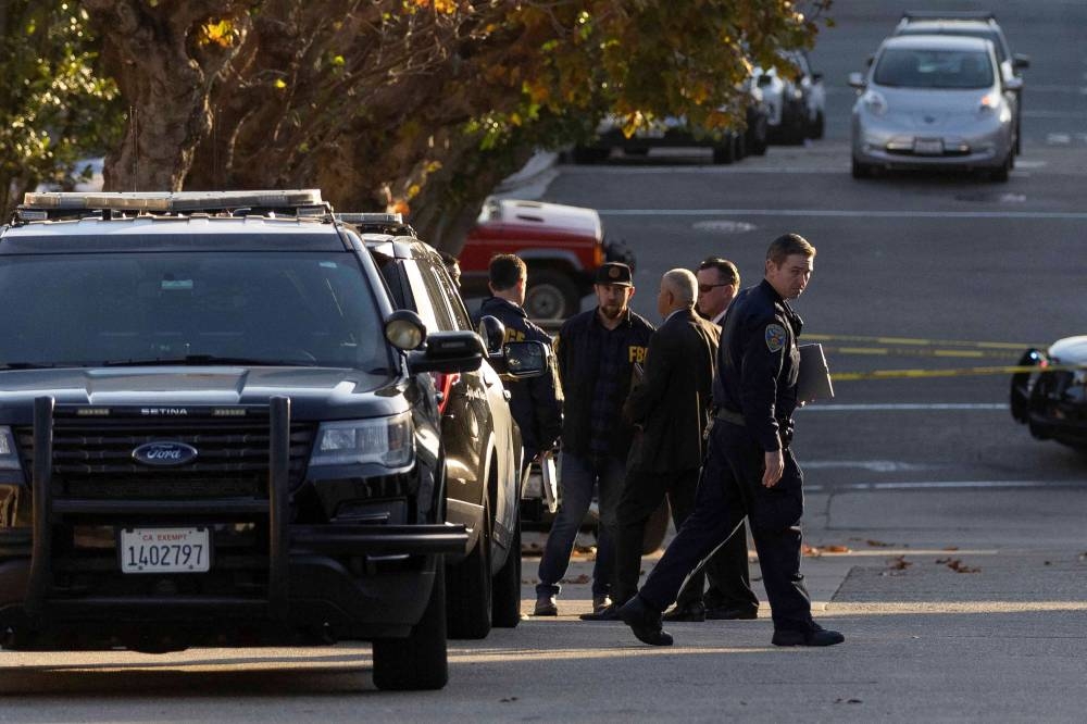Members of law enforcement work outside the home of U.S. House Speaker Nancy Pelosi where her husband Paul Pelosi was violently assaulted after a break-in at their house, according to a statement from her office, in San Francisco, California, US, October 28, 2022. — Reuters pic