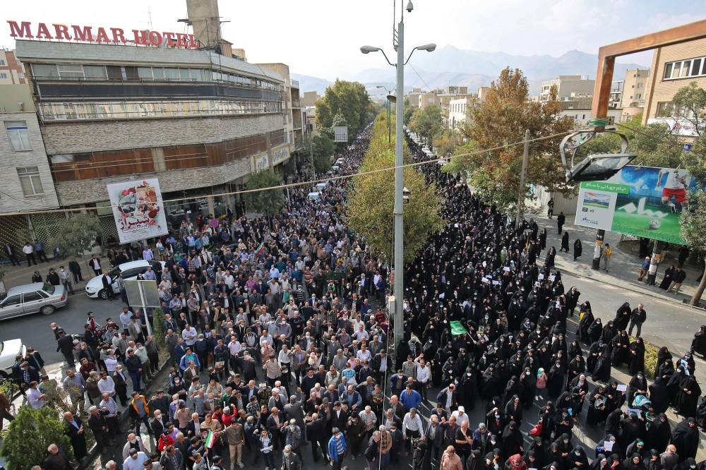 Iranians rally in support of the victims of the Shah Cheragh mausoleum and to denounce demonstrations sparked by the death of Mahsa Amini on October 28, 2022, in the central city of Hamedan. — AFP pic