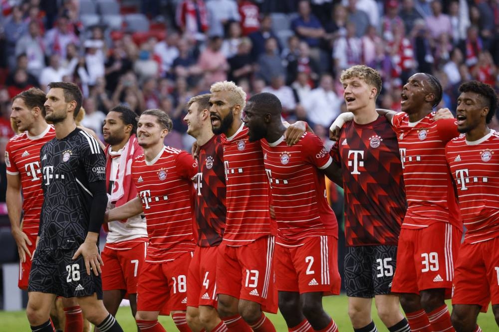 Bayern Munich players celebrate after the match against Mainz at the Allianz Arena, Munich, October 29. — Reuters pic