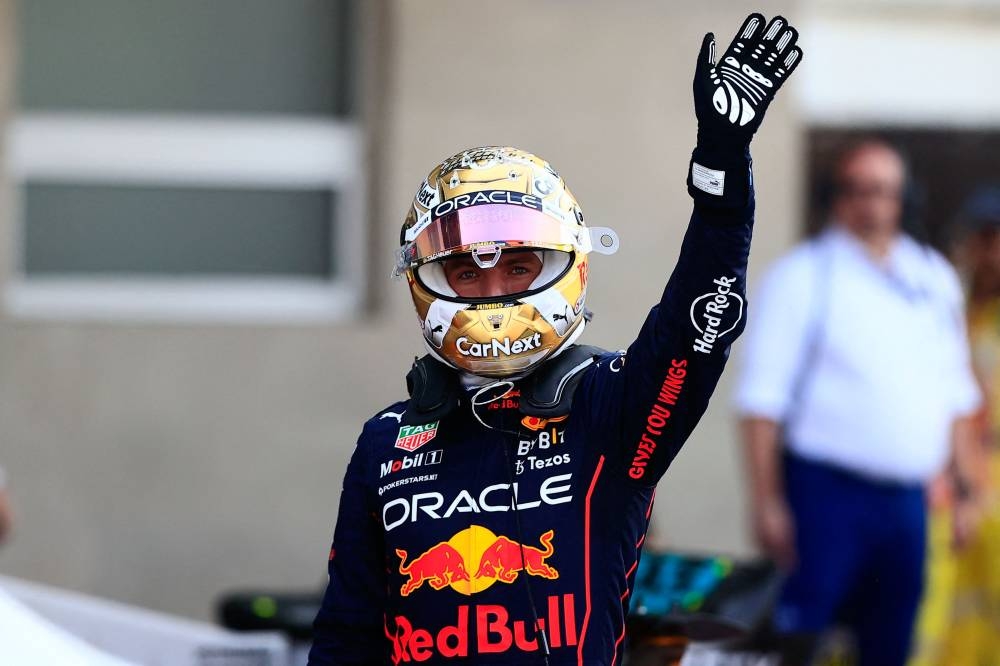 Red Bull Racing's Dutch driver Max Verstappen celebrates after taking the pole position in the Formula One Mexico Grand Prix qualifying session at the Hermanos Rodriguez racetrack in Mexico City on October 29, 2022. — AFP pic