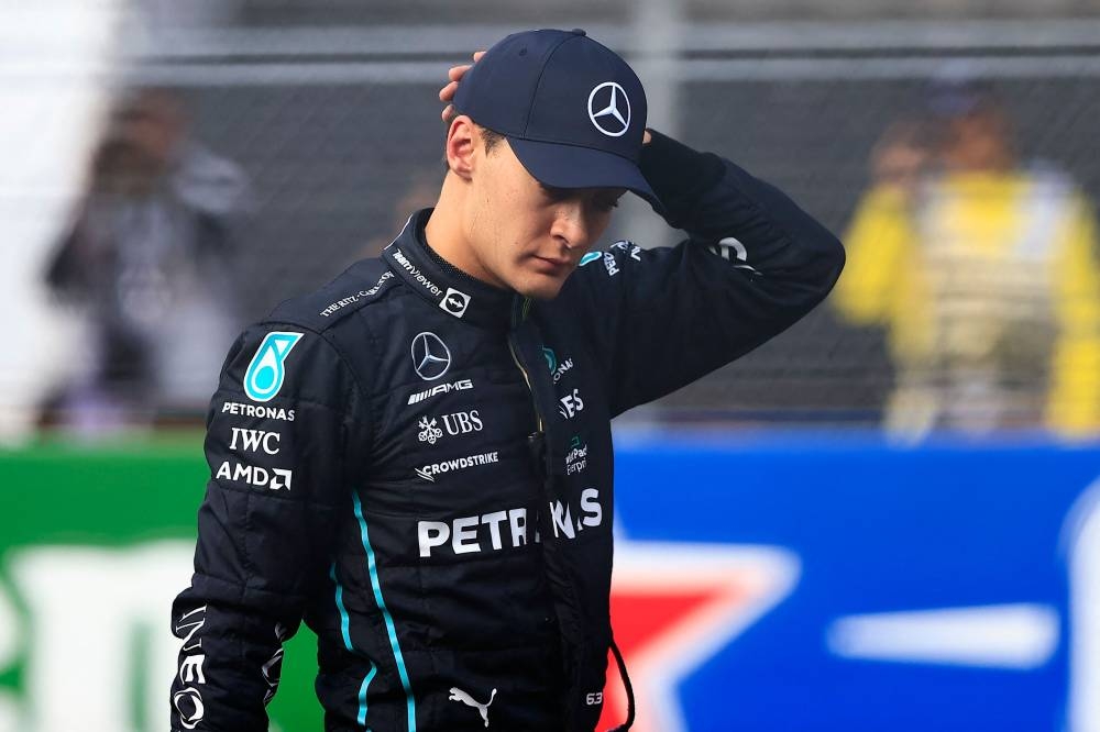 Mercedes' British driver George Russell gestures after obtaining the second place in the Formula One Mexico Grand Prix qualifying session at the Hermanos Rodriguez racetrack in Mexico City on October 29, 2022. — AFP pic