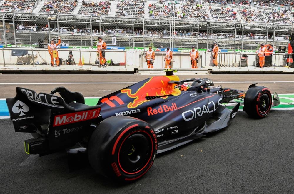 Red Bull Racing's Mexican driver Sergio Perez pulls out of the garage during the first practice session for the Formula One Mexico Grand Prix at the Hermanos Rodriguez racetrack in Mexico City on October 28, 2022. — AFP pic