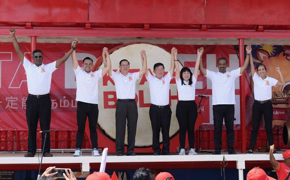 DAP candidates for Penang for GE15 (from left) RSN Rayer (Jelutong), Steven Sim (Bukit Mertajam), Lim Guan Eng (Bagan), Chow Kon Yeow (Batu Kawan), Lim Hui Ying (Tanjong), Ramkarpal Singh (Bukit Gelugor) and Syerleena Abdul Rashid (Bukit Bendera). 30 Oct 2022. — Picture by Steven KE Ooi