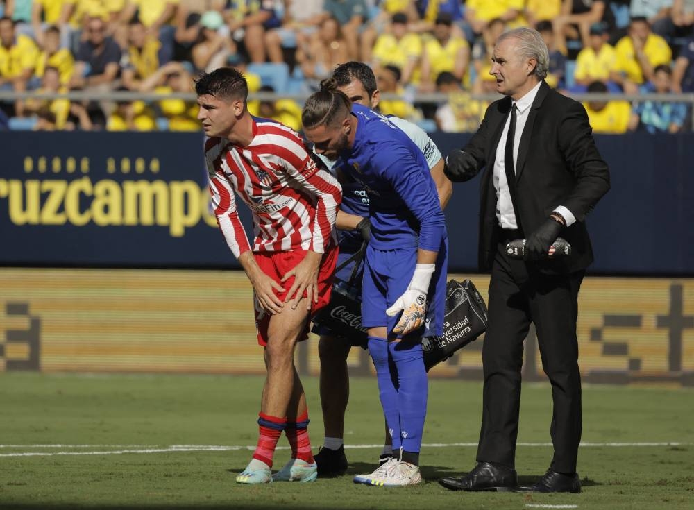 Atletico Madrid’s Alvaro Morata receives medical attention after sustaining an injury during a match against Cadiz at Estadio Nuevo Mirandilla, Cadiz, Spain, October 29, 2022. — Reuters pic 