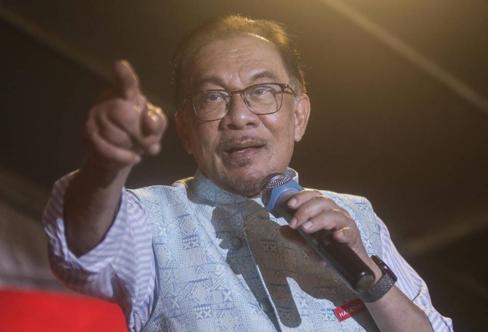 While acknowledging Bersatu deputy president Datuk Ahmad Faizal Azumu’s contributions to the constituency in his first term as MP, residents said Datuk Seri Anwar Ibrahim represented a bigger vision. — Picture by Farhan Najib 