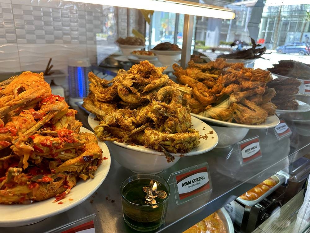 You will notice that the food like their chicken dishes is stacked up attractively.
