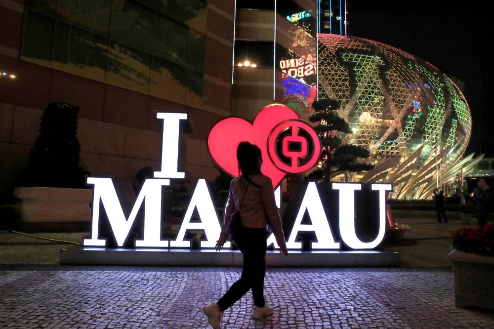 Macau authorities reinstated tough Covid-19 curbs including locking down a major casino over the weekend after a handful of cases were detected. — Reuters pic