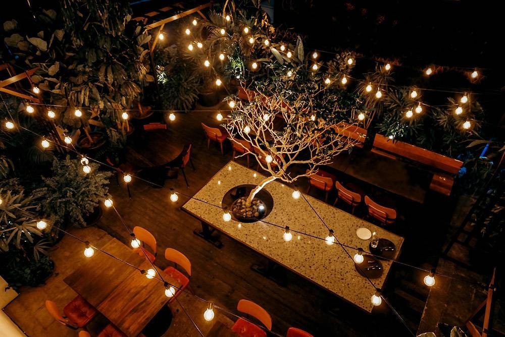 The restaurant illuminated after dark.