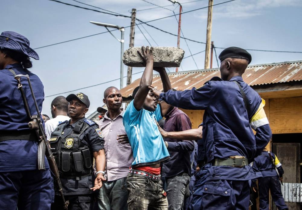 Democratic Republic of Congo Police officers block anti-Rwanda protesters as they arrive near the border of the Democratic Republic of Congo and Rwanda in Goma October 31, 2022. — AFP pic