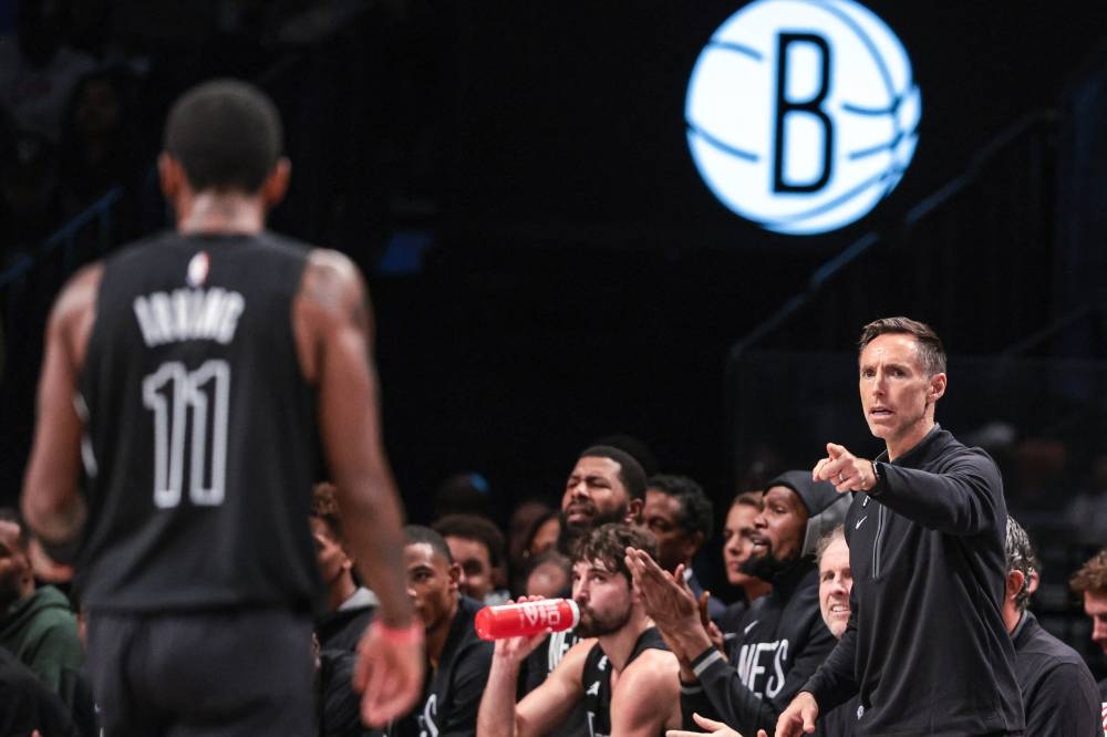 Brooklyn Nets head coach Steve Nash points towards guard Kyrie Irving (11) during the first half against the Indiana Pacers at the Barclays Center, Brooklyn October 31, 2022. — Reuters pic