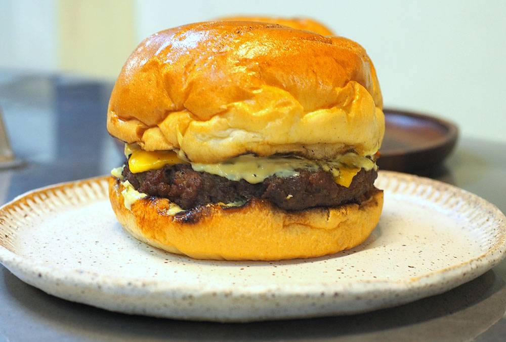 The O.G is a satisfying juicy beef burger with a salty umami hit from their homemade onion jam.