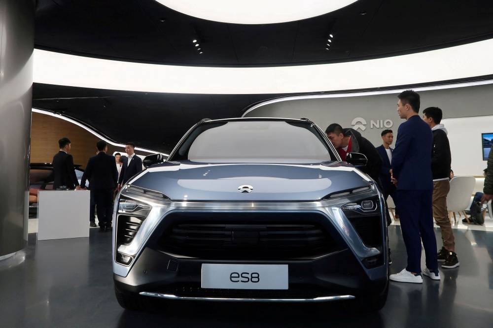 NIO ES8, an all-electric sport utility vehicle, is displayed inside a NIO House ‘brand experience’ store, in Beijing, China November 25, 2017. — Reuters pic