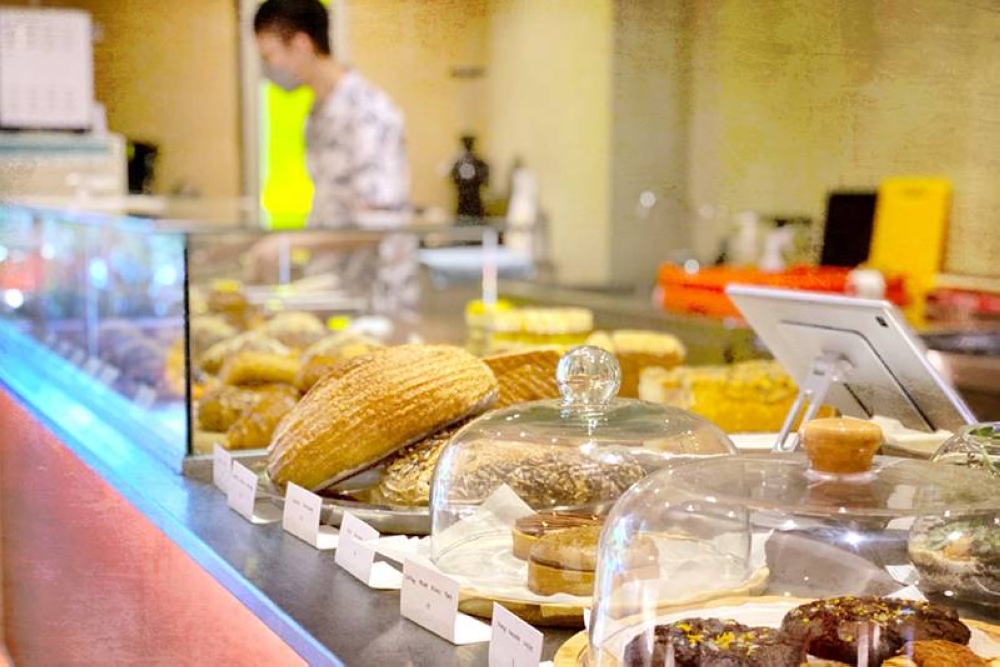 Countless choices of cookies, pastries and cakes at the counter.