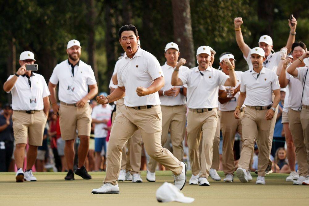 Tom Kim celebrating his winning putt against Patrick Cantlay-Xander Schauffele during the Presidents Cup. — Getty Images pic