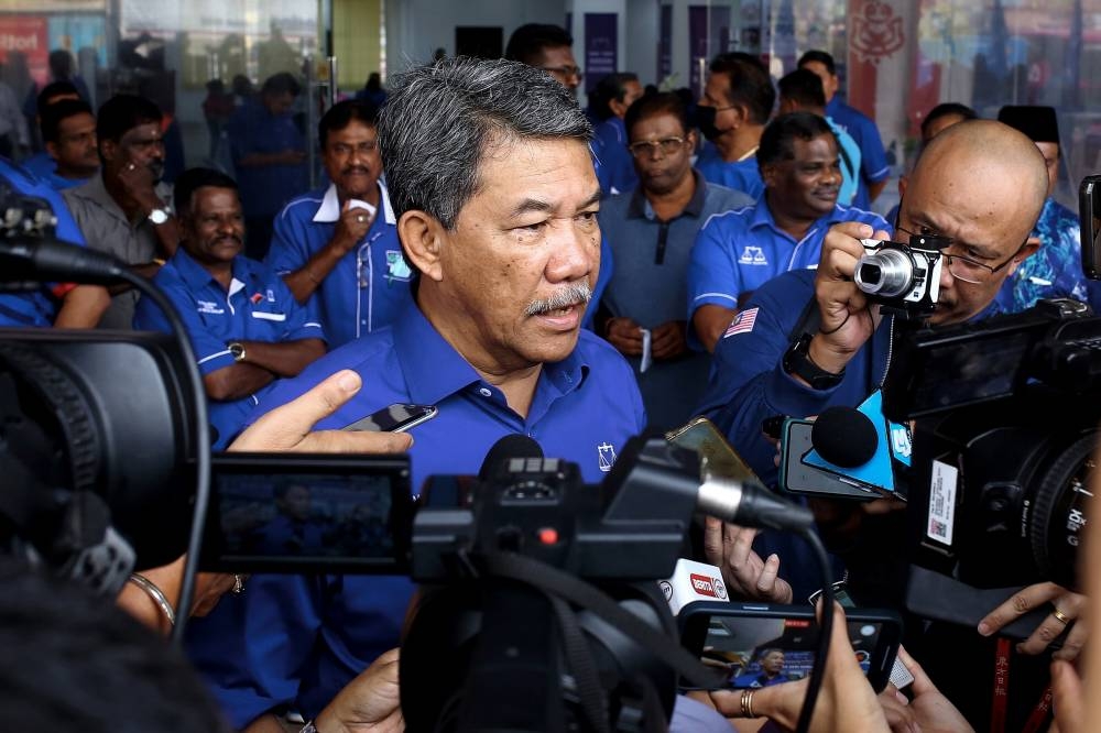 Datuk Seri Mohamad Hasan speaks to reporters at Wisma Umno Negri Sembilan in Seremban November 3, 2022. — Bernama pic