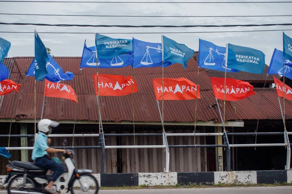 File picture of Perikatan Nasional, Barisan Nasional and Pakatan Harapan flags pictured along Jalan Klebang in Melaka, November 10, 2021. ― Picture by Shafwan Zaidon