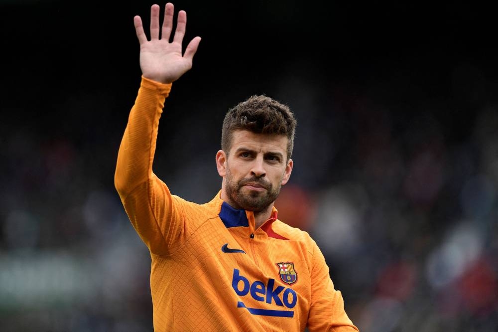 FC Barcelona's Gerard Pique waves at fans ahead of the match against Elche at Estadio Manuel Martinez Valero, Elche March 6, 2022. — Reuters pic