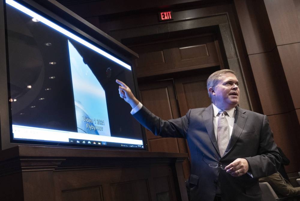 US Deputy Director of Naval Intelligence Scott Bray explains a video of unidentified aerial phenomena, as he testifies before a House Intelligence Committee subcommittee hearing at the US Capitol on May 17, 2022 in Washington, DC. — Kevin Dietsch/Getty Images/AFP pic