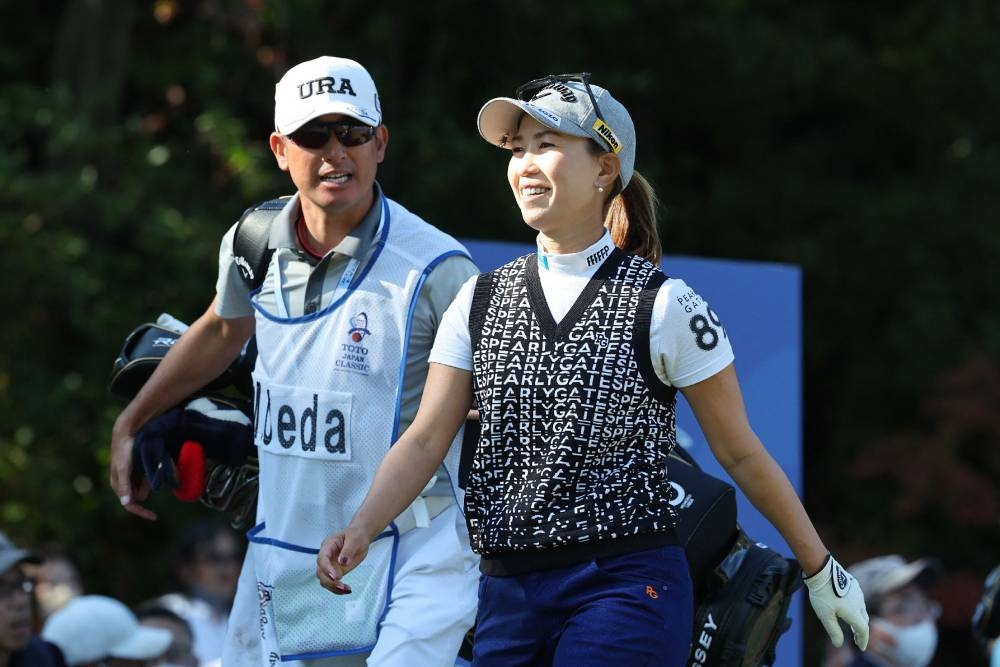 Momoko Ueda of Japan smiles after a tee shot during the first round of the LPGA Japan Classic golf tournament in Otsu, Shiga prefecture, November 3, 2022. —JIJI Press handout pic via AFP 