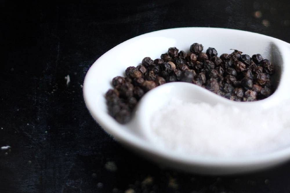 Season generously with salt and pepper.