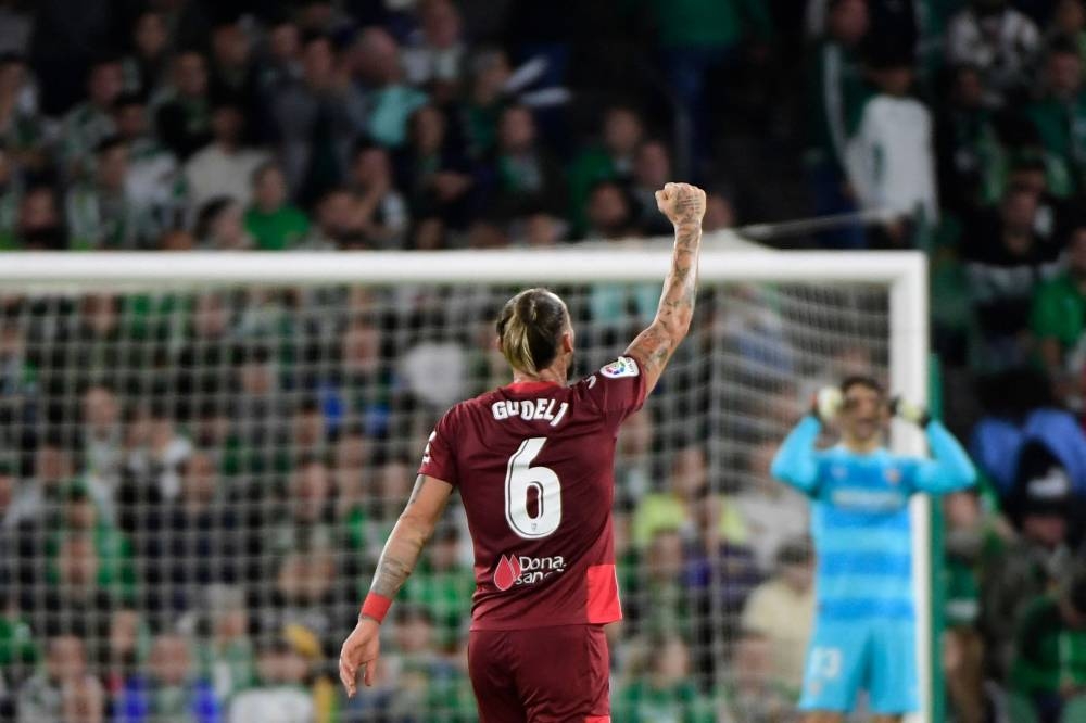 Sevilla's Serbian midfielder Nemanja Gudelj celebrates scoring his team's first goal during the Spanish league football match between Real Betis and Sevilla FC at the Benito Villamarin stadium in Seville on November 6, 2022. — AFP pic