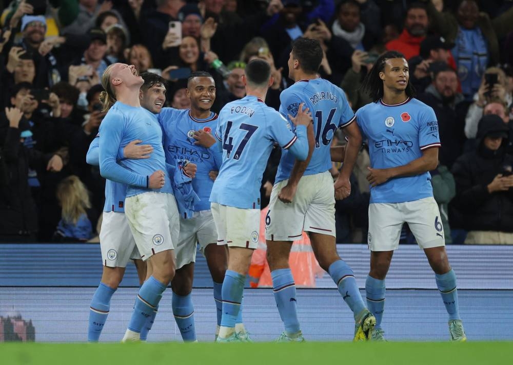 Manchester City’s Erling Haaland celebrates scoring their second goal with teammates during the match against Fulham at Etihad Stadium, Manchester, Britain, November 5, 2022. — Action Images pic via Reuters