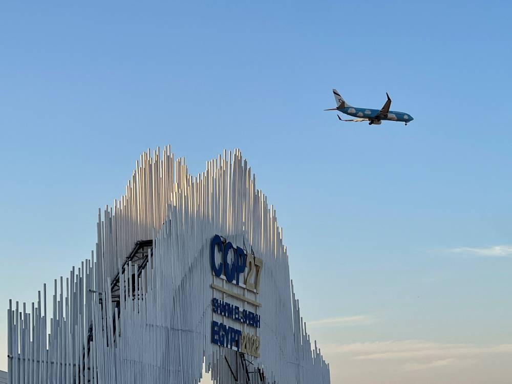 A view of a plane flying over Sharm El-Sheikh, during the COP27 climate summit in Red Sea resort of Sharm el-Sheikh November 7, 2022. — Reuters pic