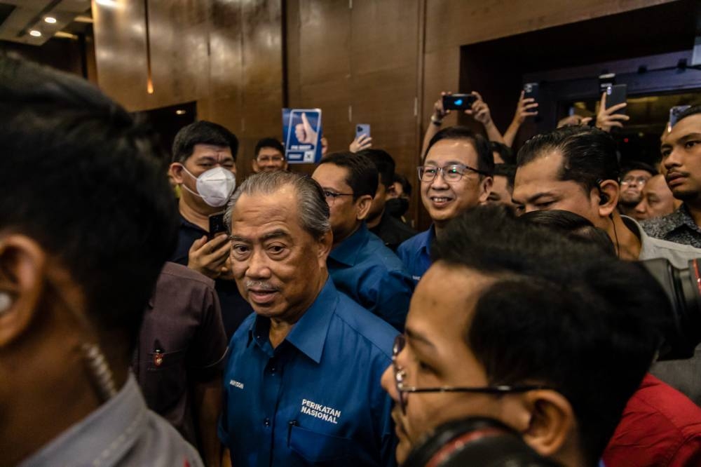 Tan Sri Muhyiddin Yassin arrives during the launch of Perikatan Nasional's manifesto at the Glenmarie Hotel and Golf Resort in Shah Alam November 6, 2022. — Picture by Firdaus Latif
