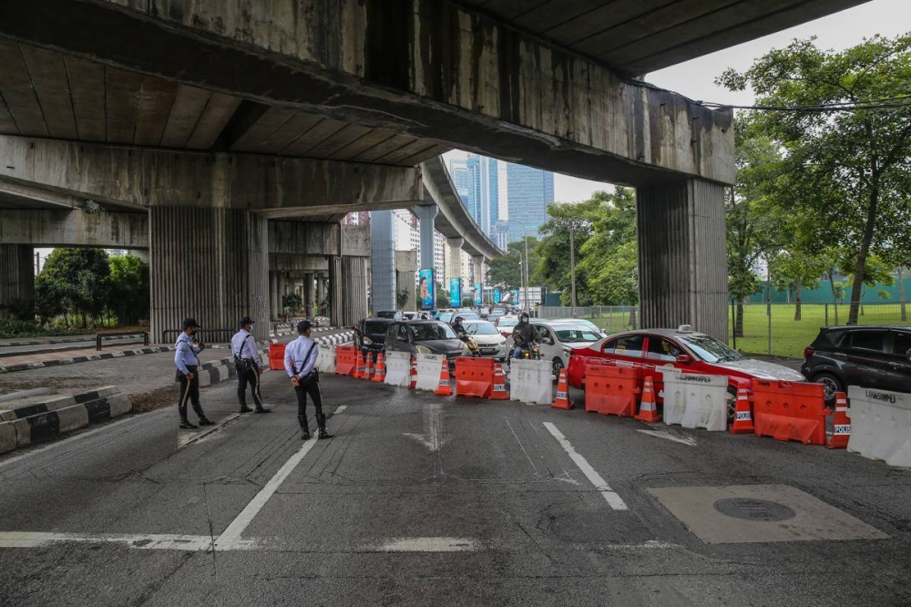 Kuala Lumpur Police chief Datuk Azmi Abu Kassim said the international-level race, which is expected to draw about 20,000 local and overseas runners, will involve four categories: 5 kilometres (km), 10km, 21km half marathon and 42km full marathon. — Picture by Yusof Mat Isa