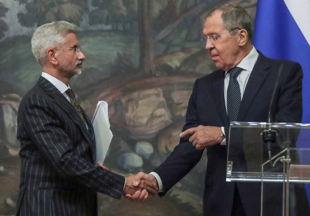Russian Foreign Minister Sergei Lavrov and his Indian counterpart Subrahmanyam Jaishankar shake hands during a news conference following their talks in Moscow November 8, 2022. — Maxim Shipenkov/Pool/Reuters pic