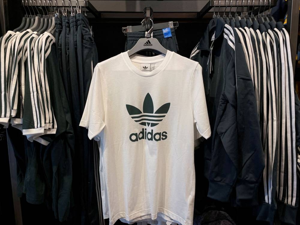 Adidas merchandise is seen in an Adidas store on the day the German company terminated its partnership with the American rapper and designer Kanye West, now known as Ye, in Garden City, New York October 25, 2022. — Reuters pic