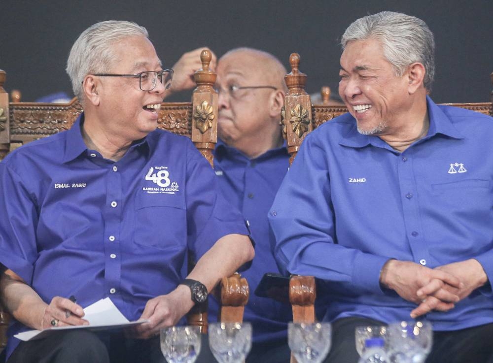 Datuk Seri Ismail Sabri Yaakob and Datuk Seri Ahmad Zahid Hamidi attend a Barisan Nasional programme in Bagan Datuk October 17, 2022. — Picture by Farhan Najib