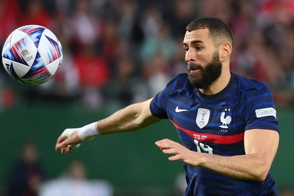 This file photograph taken June 10, 2022, shows France’s forward Karim Benzema controlling the ball during the Uefa Nations League match Austria v France at the Ernst Happel stadium in Vienna, Austria. — AFP pic 