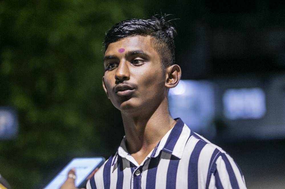 Student A. Puvanesan, 18 says he is unsure of what he wants as a voter, and that the most striking image that comes to mind when elections are mentioned is political flags and banners everywhere. — Picture by Hari Anggara