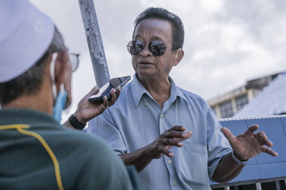 Taxi driver Mohd Sap Md Amin said he was frustrated by what he saw in Umno and the numerous allegations of corruption and charges levelled at some of its leaders. — Picture by Hari Anggara