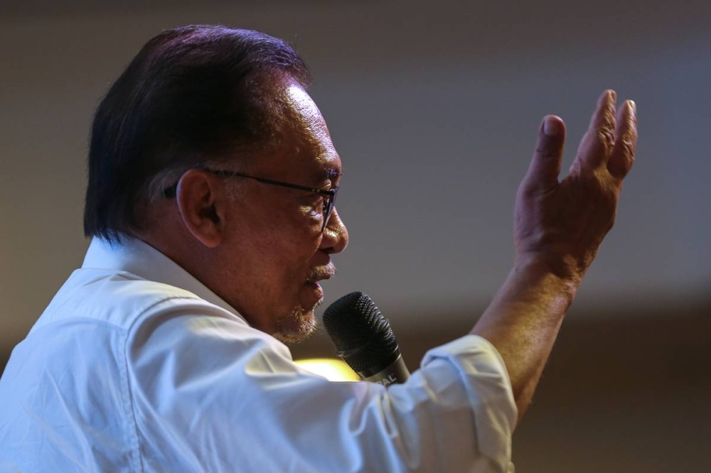 Datuk Seri Anwar Ibrahim, who is also the PKR president, said that the Islamist party leader has no principles despite preaching about Islam and claiming to fight for Malay rights. — Picture by Yusof Mat Isa 