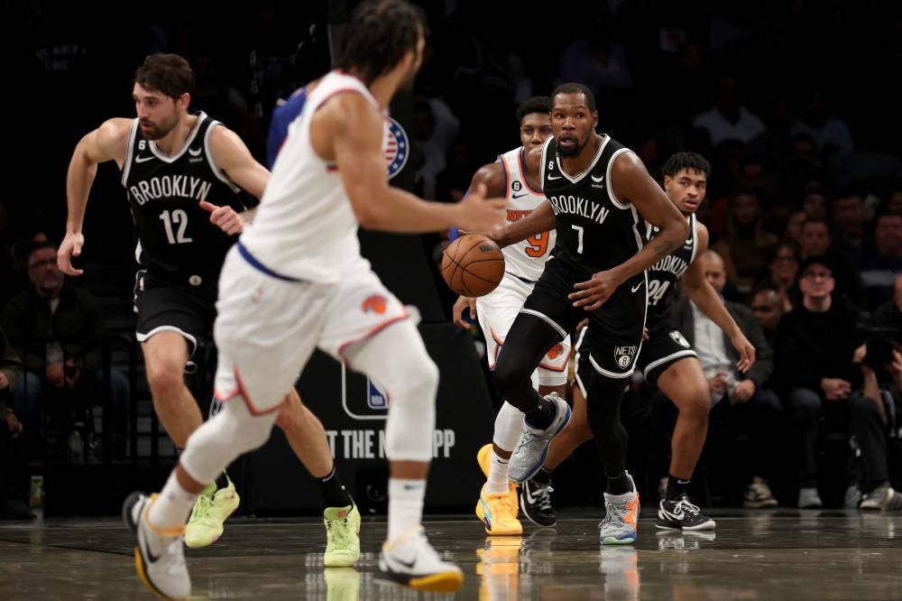 Brooklyn Nets forward Kevin Durant (7) brings the ball up court against the New York Knicks during the third quarter at Barclays Center in Brooklyn November 9, 2022. — Reuters pic