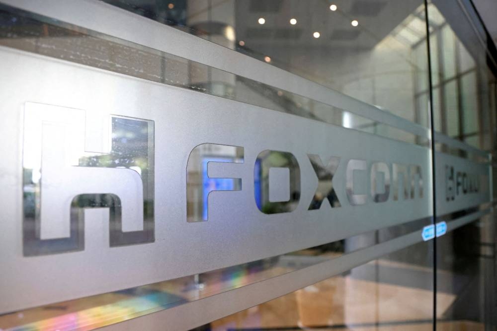 The Foxconn logo is seen on a glass door at its office building in Taipei, Taiwan November 12, 2020. — Reuters pic