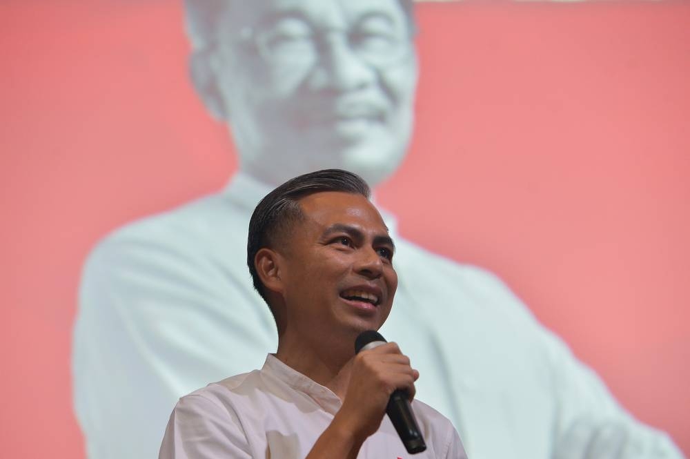 PH communications director Fahmi Fadzil highlighted that the manifesto is also responding to more recent and pressing issues such as climate change, contract doctors, jobs, wages, cost of living, housing and public transport and the economy. — Picture by Miera Zulyana