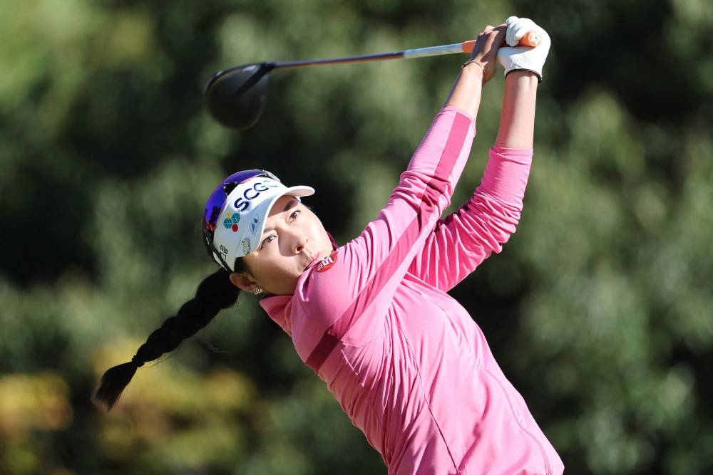 Atthaya Thitikul of Thailand hits a shot on the final day of the LPGA Japan Classic golf tournament in Otsu, Shiga prefecture on November 6, 2022. — AFP pic